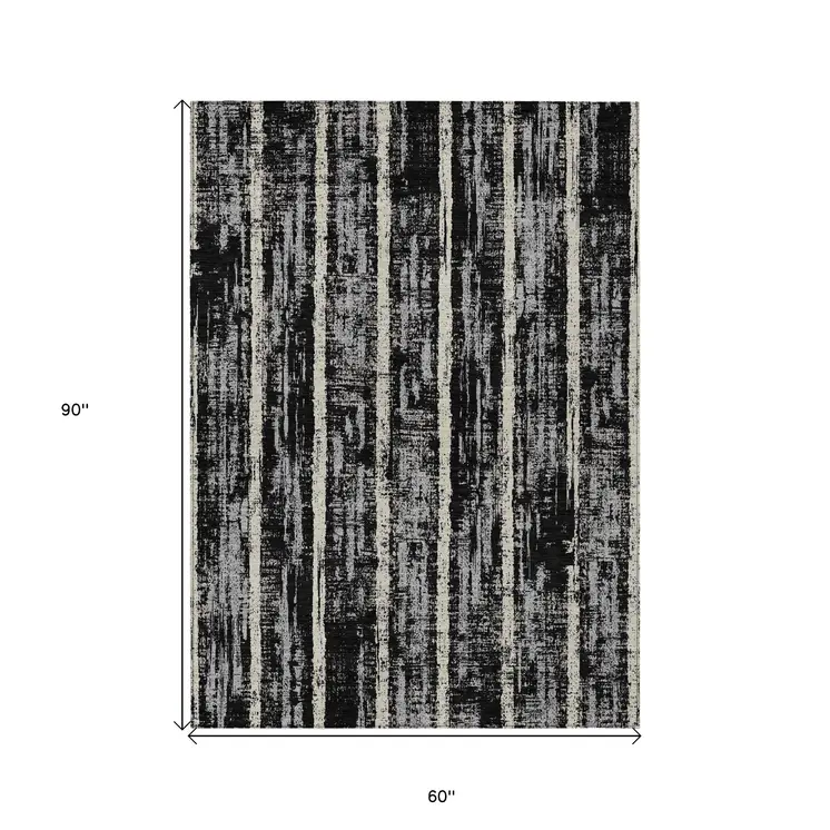 5' X 8' Black Gray And Ivory Striped Washable Indoor Outdoor Area Rug