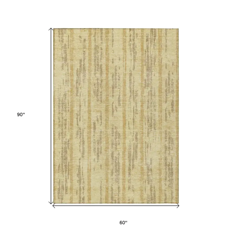 5' X 8' Gold And Brown Striped Washable Indoor Outdoor Area Rug