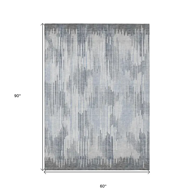 5' X 8' Gray And Ivory Striped Washable Indoor Outdoor Area Rug