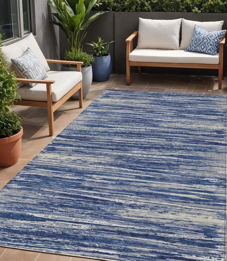 5' X 8' Navy Blue And Ivory Striped Washable Indoor Outdoor Area Rug