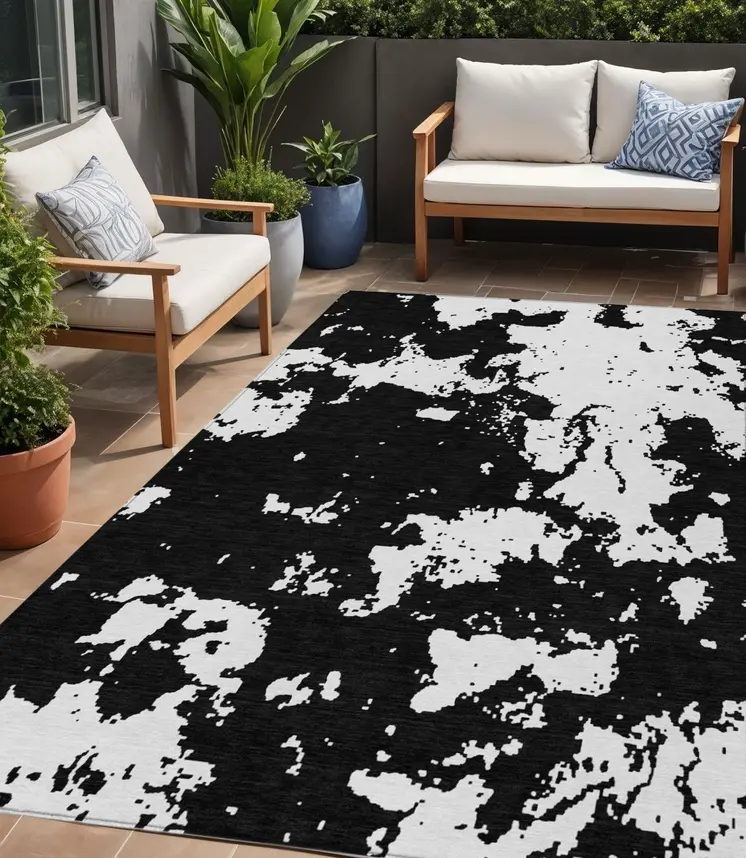 5' X 8' Black And Ivory Abstract Washable Indoor Outdoor Area Rug