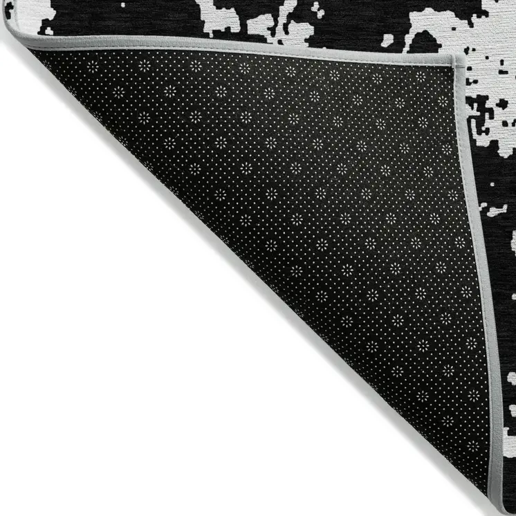 9' X 12' Black And Ivory Abstract Washable Indoor Outdoor Area Rug