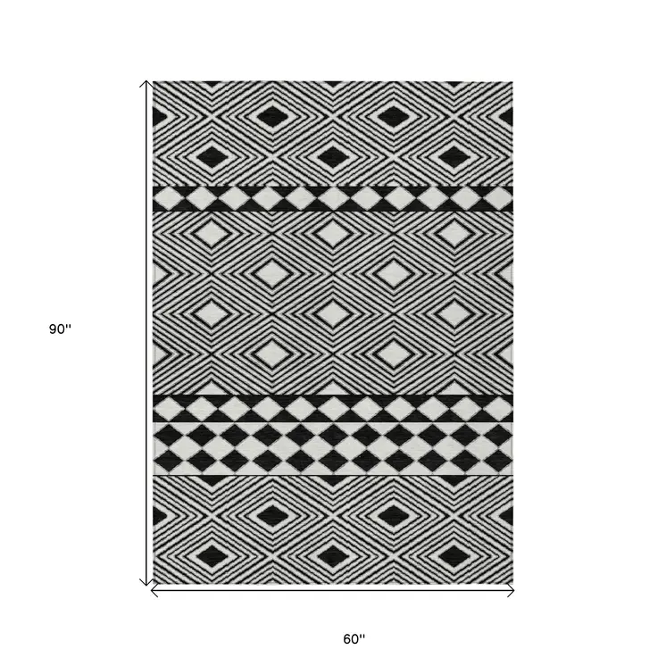 5' X 8' Black And Ivory Geometric Washable Indoor Outdoor Area Rug