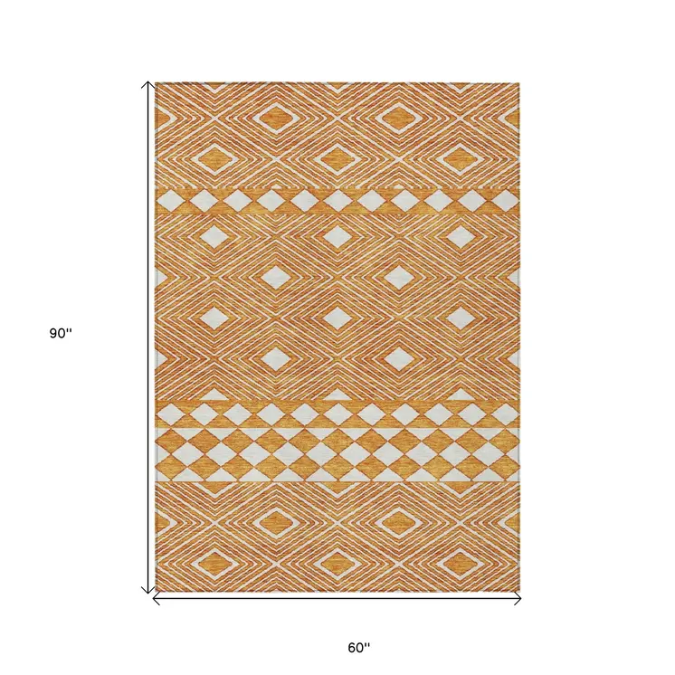 5' X 8' Orange And Ivory Geometric Washable Indoor Outdoor Area Rug