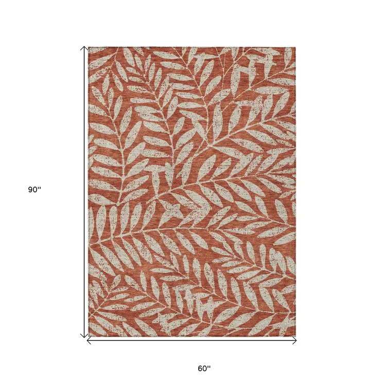 5' X 8' Orange And Ivory Floral Washable Indoor Outdoor Area Rug