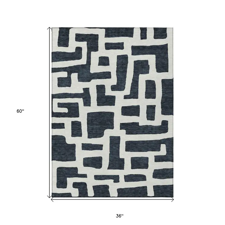 3' X 5' Black And Ivory Abstract Washable Indoor Outdoor Area Rug