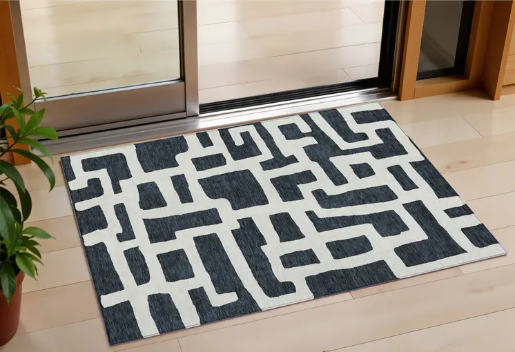 3' X 5' Black And Ivory Abstract Washable Indoor Outdoor Area Rug