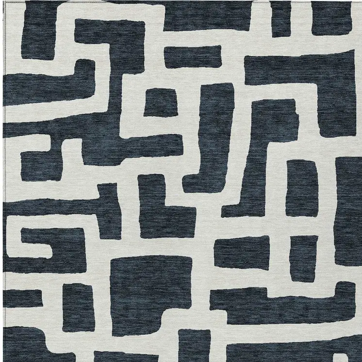 5' X 8' Black And Ivory Abstract Washable Indoor Outdoor Area Rug