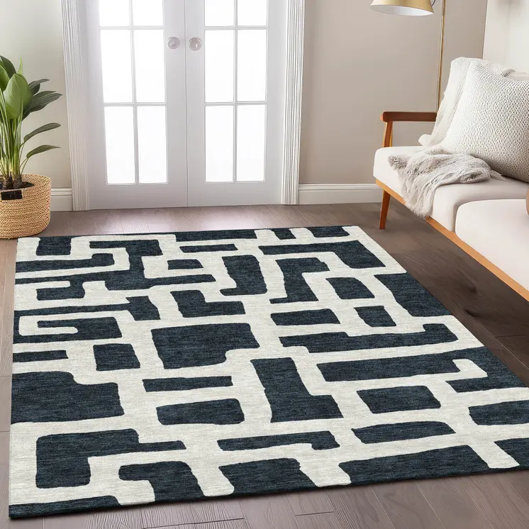 5' X 8' Black And Ivory Abstract Washable Indoor Outdoor Area Rug