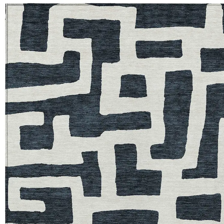 9' X 12' Black And Ivory Abstract Washable Indoor Outdoor Area Rug