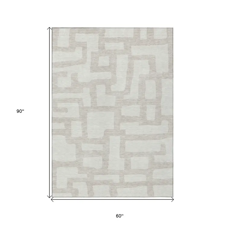 5' X 8' Ivory And Beige Abstract Washable Indoor Outdoor Area Rug