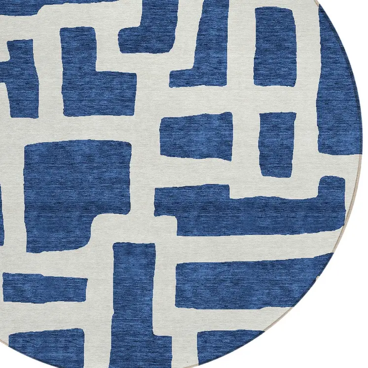 8' Navy Blue And Ivory Round Abstract Washable Indoor Outdoor Area Rug
