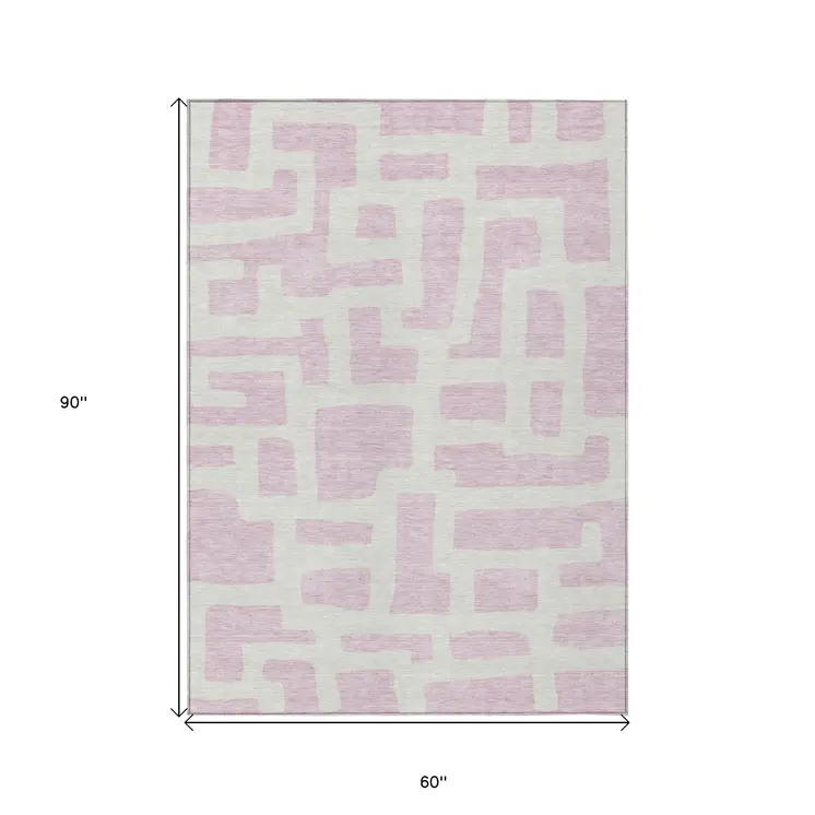 5' X 8' Pink And Ivory Abstract Washable Indoor Outdoor Area Rug