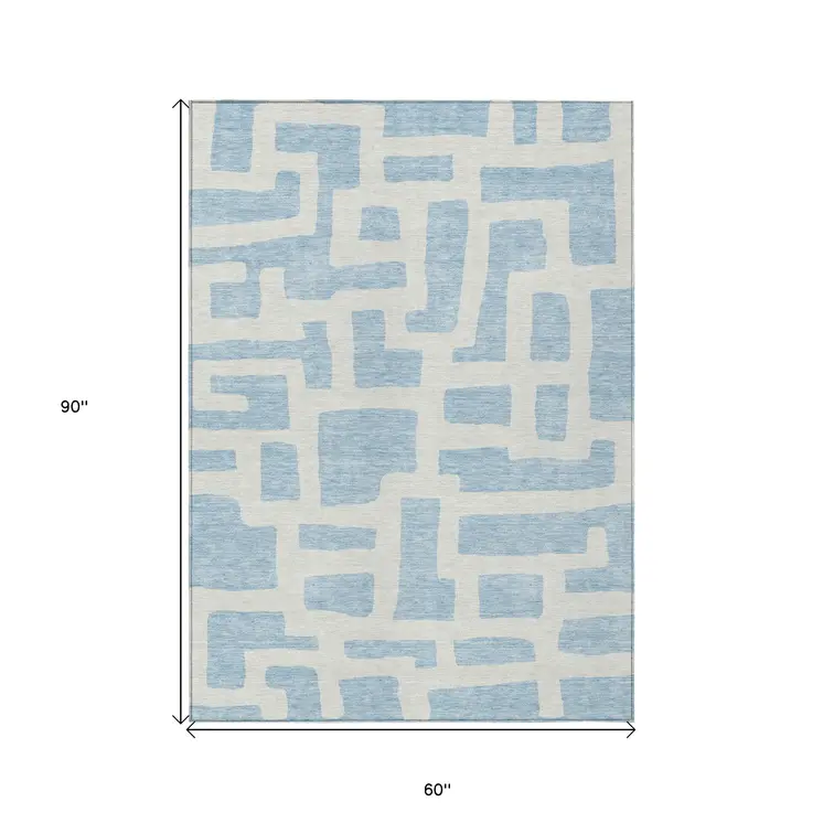 5' X 8' Sky Blue And Ivory Abstract Washable Indoor Outdoor Area Rug