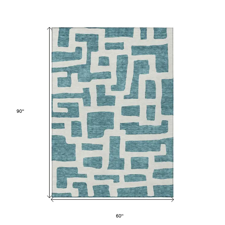 5' X 8' Teal Blue And Ivory Abstract Washable Indoor Outdoor Area Rug