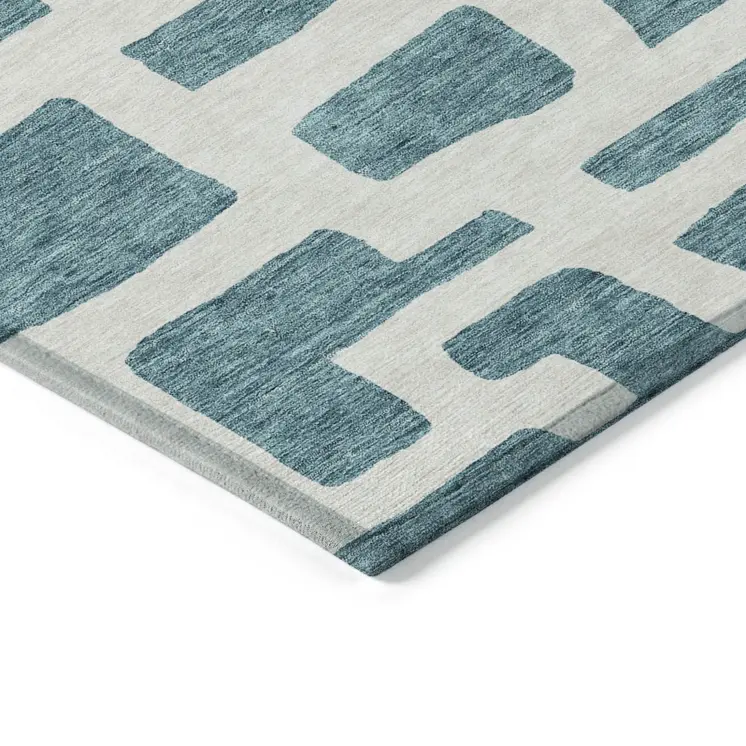 5' X 8' Teal Blue And Ivory Abstract Washable Indoor Outdoor Area Rug