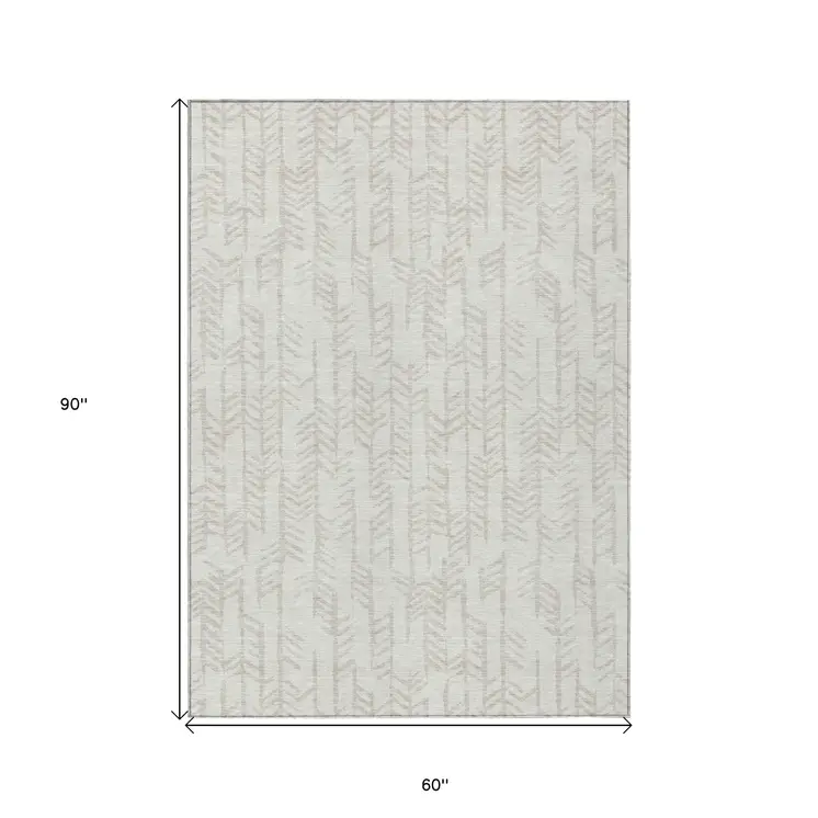 5' X 8' Ivory And Beige Tribal Washable Indoor Outdoor Area Rug