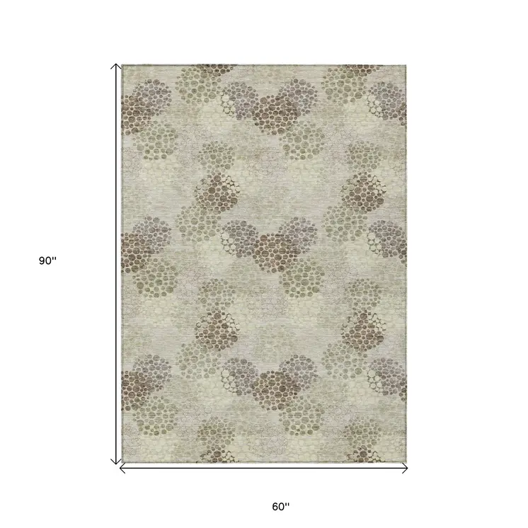 5' X 8' Beige Green And Ivory Polka Dot Washable Indoor Outdoor Area Rug