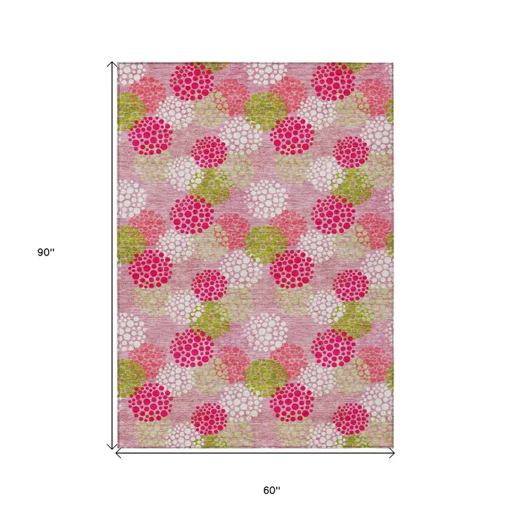 5' X 8' Pink Green And Ivory Polka Dot Washable Indoor Outdoor Area Rug