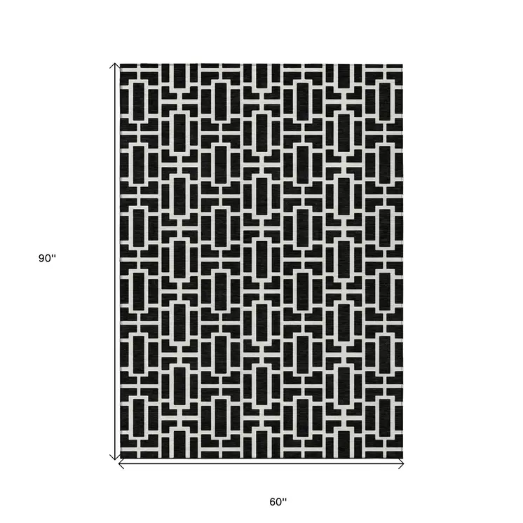 5' X 8' Black And Ivory Geometric Washable Indoor Outdoor Area Rug