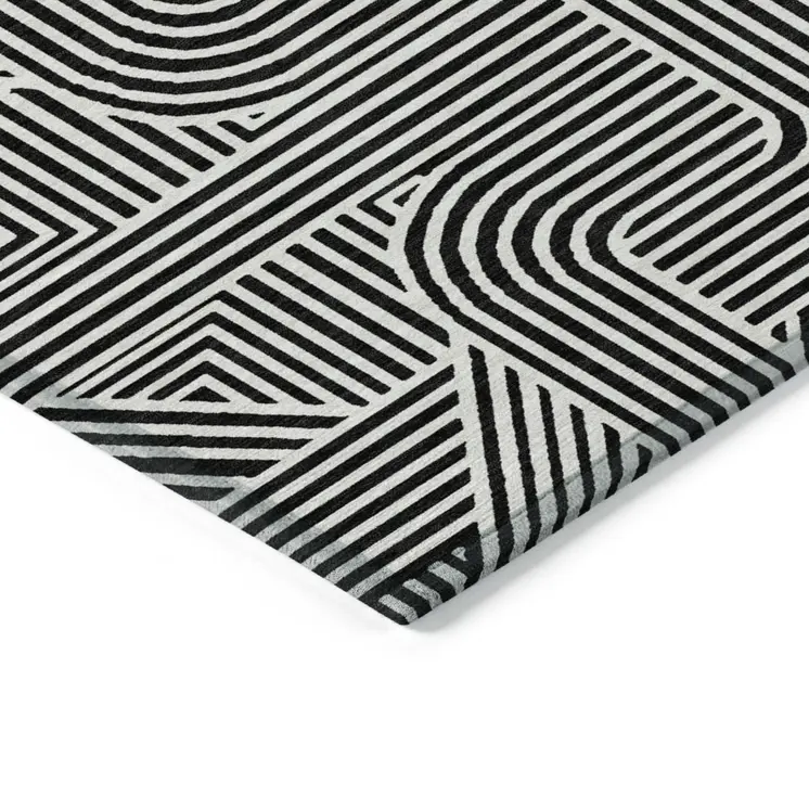 3' X 5' Black And Ivory Abstract Washable Indoor Outdoor Area Rug