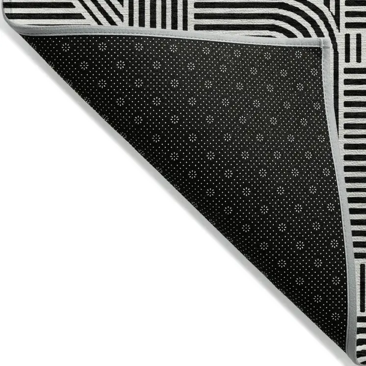 8' X 10' Black And Ivory Abstract Washable Indoor Outdoor Area Rug