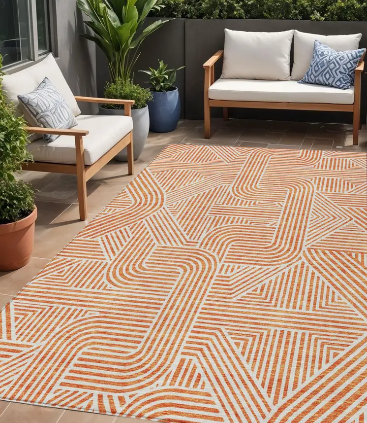 5' X 8' Orange And Ivory Abstract Washable Indoor Outdoor Area Rug