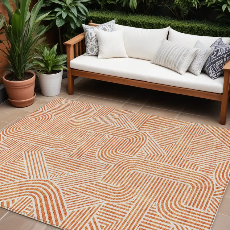 9' X 12' Orange And Ivory Abstract Washable Indoor Outdoor Area Rug