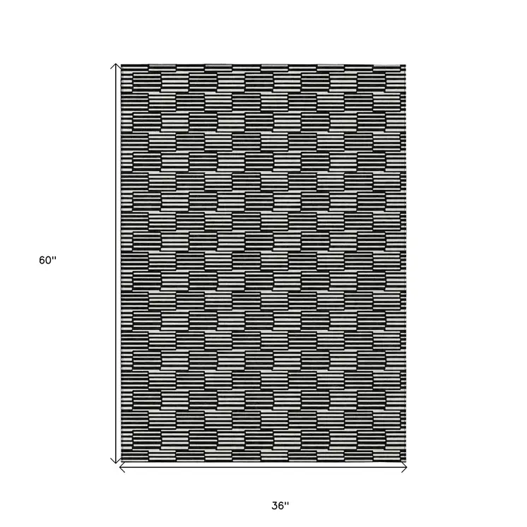 3' X 5' Black And Ivory Geometric Washable Indoor Outdoor Area Rug