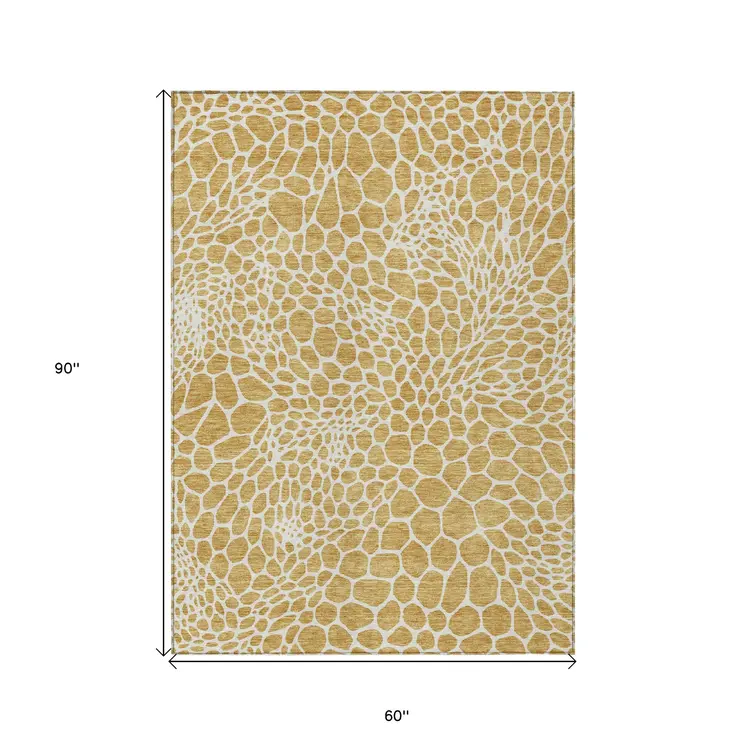 5' X 8' Gold And Ivory Geometric Washable Indoor Outdoor Area Rug