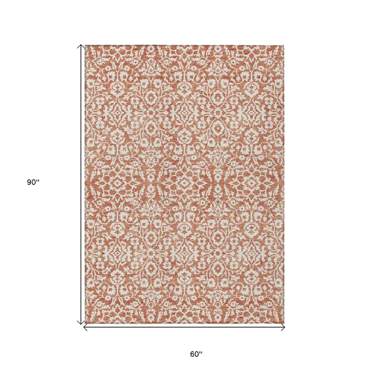 5' X 8' Coral And Ivory Damask Washable Indoor Outdoor Area Rug