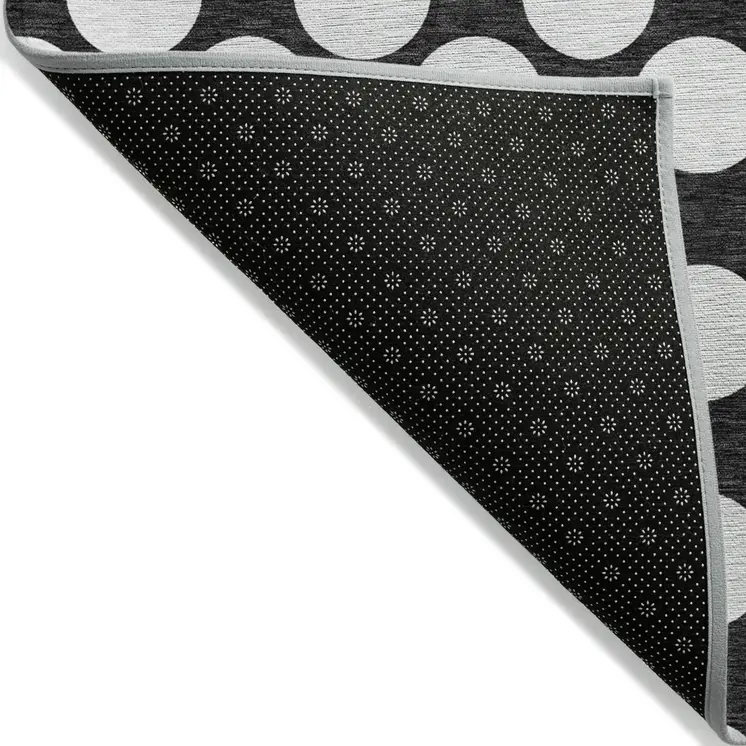 5' X 8' Black And Ivory Polka Dot Washable Indoor Outdoor Area Rug