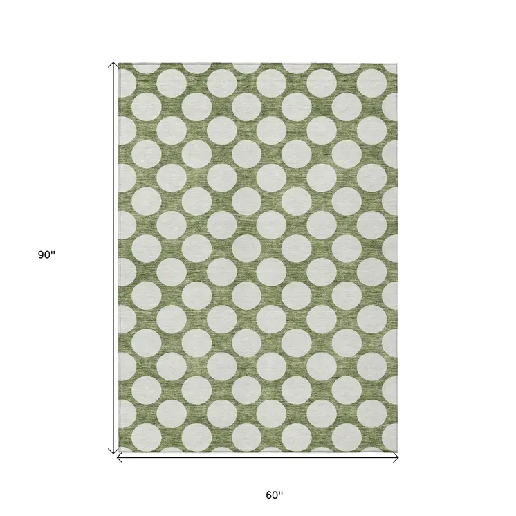 5' X 8' Green And Ivory Polka Dot Washable Indoor Outdoor Area Rug