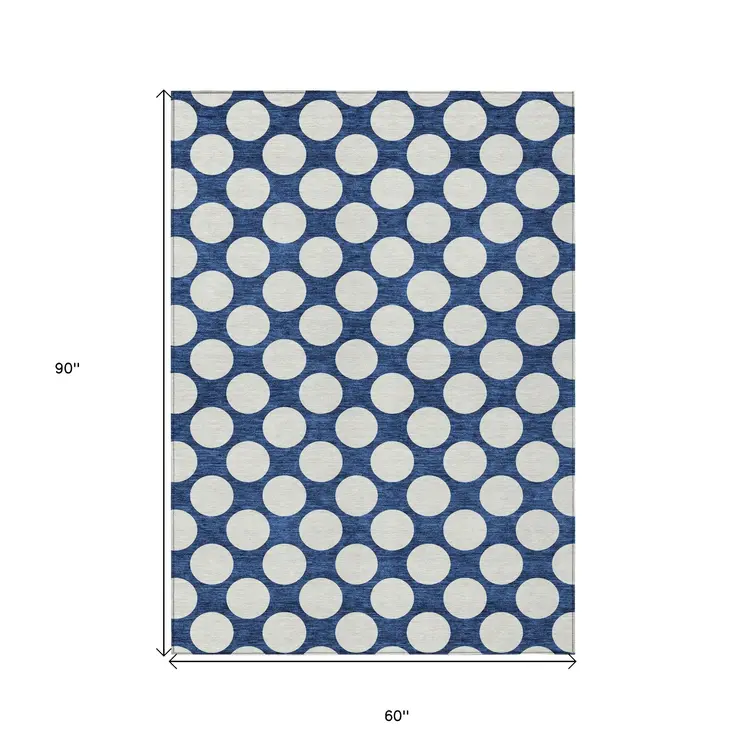 5' X 8' Navy Blue And Ivory Polka Dot Washable Indoor Outdoor Area Rug