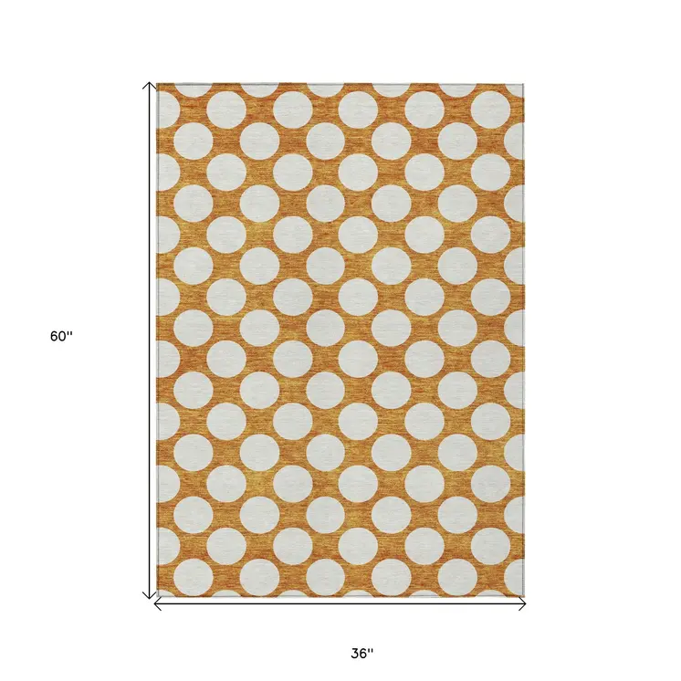 3' X 5' Orange And Ivory Polka Dot Washable Indoor Outdoor Area Rug