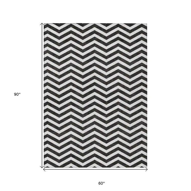 5' X 8' Black And Ivory Chevron Washable Indoor Outdoor Area Rug
