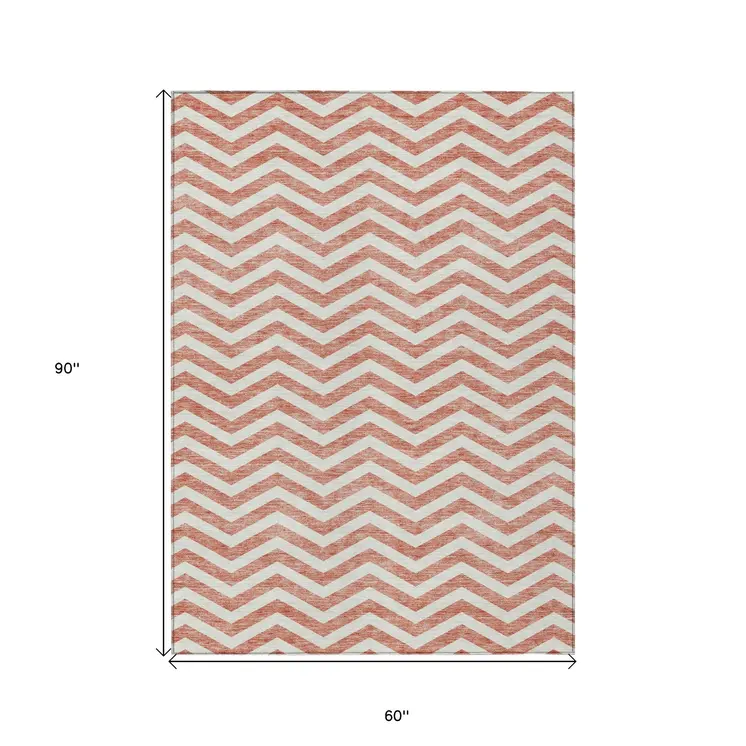 5' X 8' Salmon And Ivory Chevron Washable Indoor Outdoor Area Rug