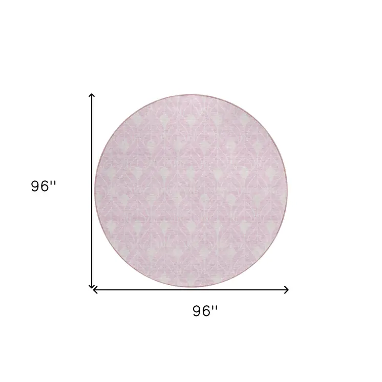 8' Pink And Ivory Round Geometric Washable Indoor Outdoor Area Rug