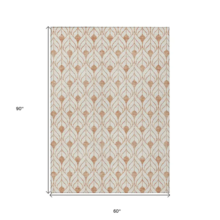 5' X 8' Salmon And Beige Geometric Washable Indoor Outdoor Area Rug