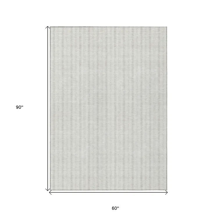 5' X 8' Ivory And Beige Striped Washable Indoor Outdoor Area Rug