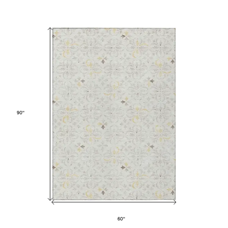 5' X 8' Ivory Gray And Gold Floral Washable Indoor Outdoor Area Rug