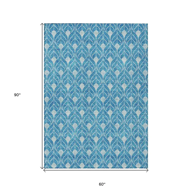 5' X 8' Teal Blue And Ivory Geometric Washable Indoor Outdoor Area Rug