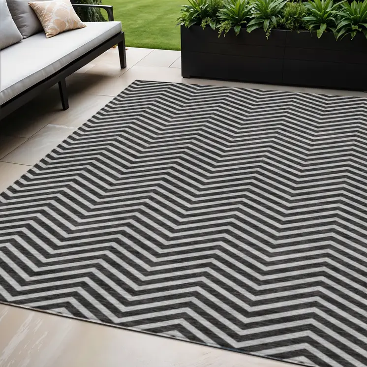 5' X 8' Black And Ivory Chevron Washable Indoor Outdoor Area Rug