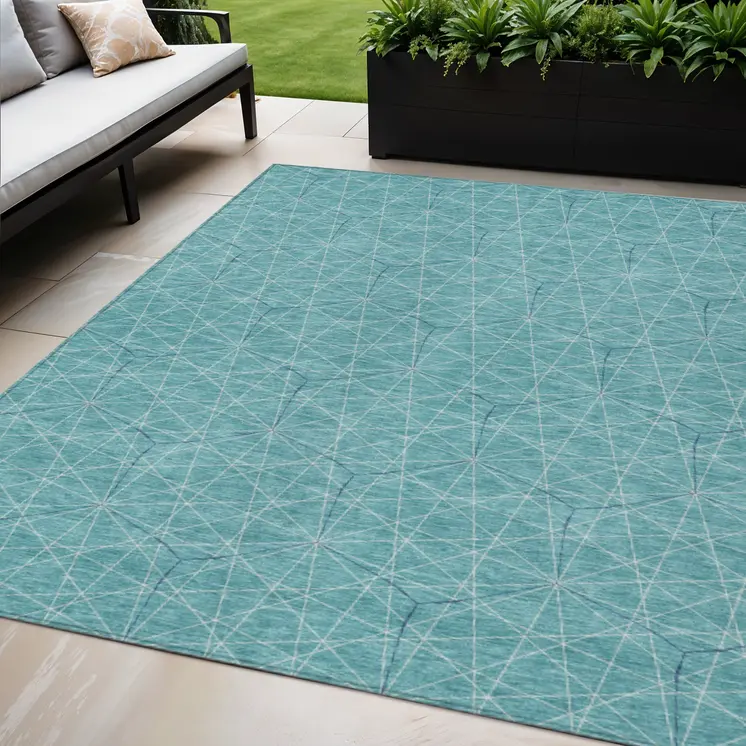 5' X 8' Teal Blue Black And Ivory Geometric Washable Indoor Outdoor Area Rug