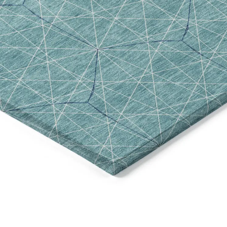 5' X 8' Teal Blue Black And Ivory Geometric Washable Indoor Outdoor Area Rug