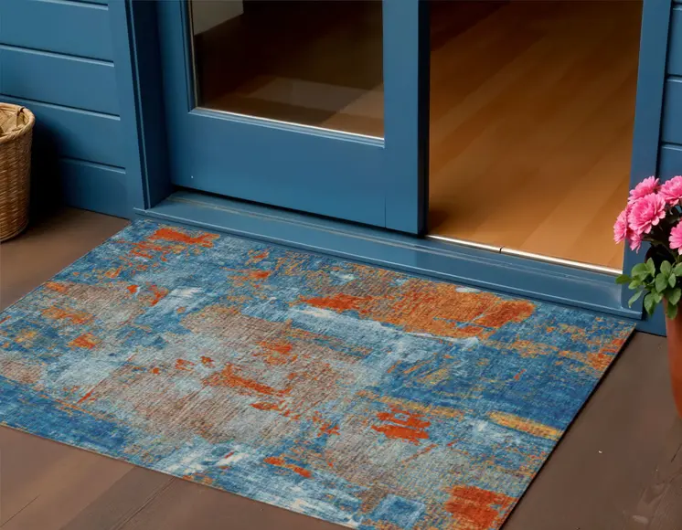 3' X 5' Navy Blue Orange And Ivory Abstract Washable Indoor Outdoor Area Rug