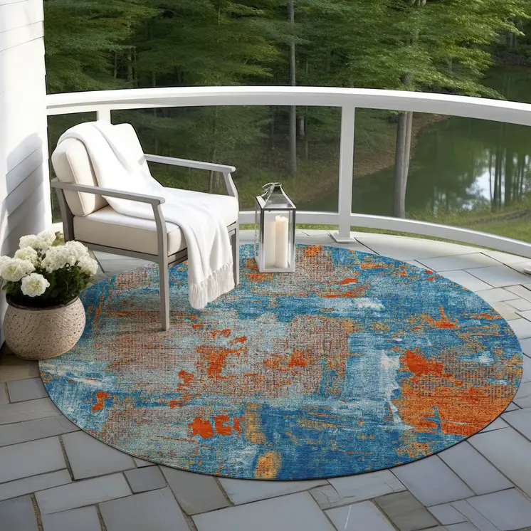 8' Navy Blue Orange And Ivory Round Abstract Washable Indoor Outdoor Area Rug