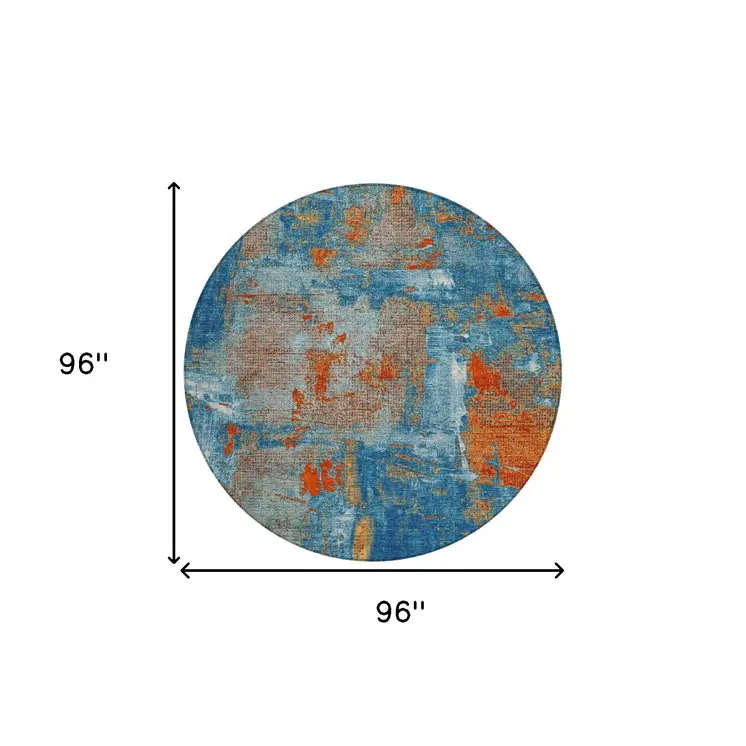 8' Navy Blue Orange And Ivory Round Abstract Washable Indoor Outdoor Area Rug