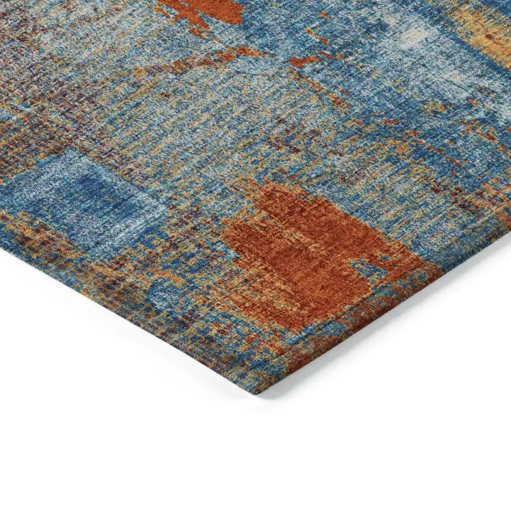 8' X 10' Navy Blue Orange And Ivory Abstract Washable Indoor Outdoor Area Rug