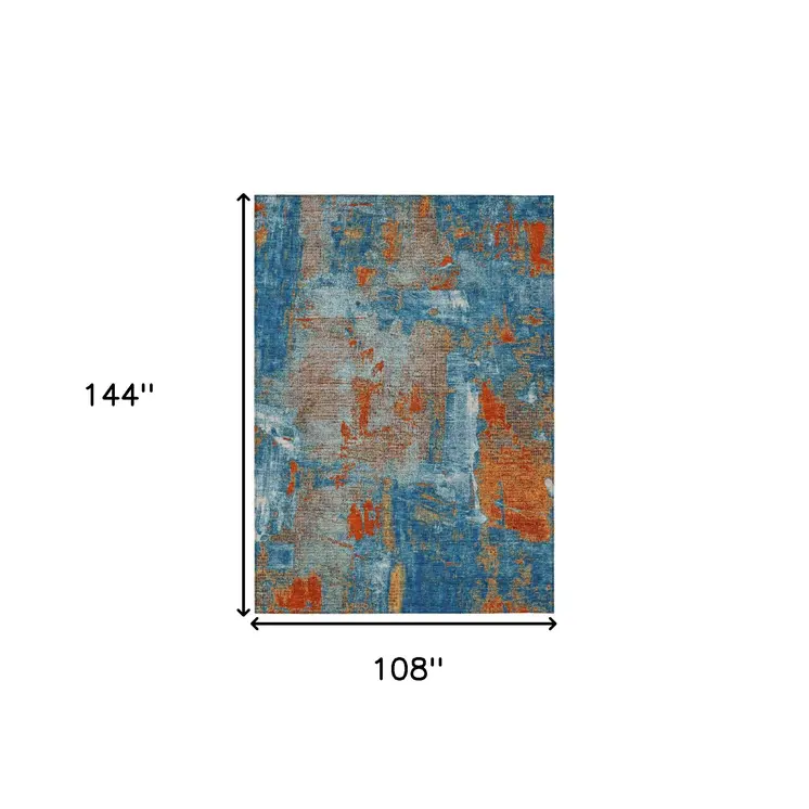 9' X 12' Navy Blue Orange And Ivory Abstract Washable Indoor Outdoor Area Rug